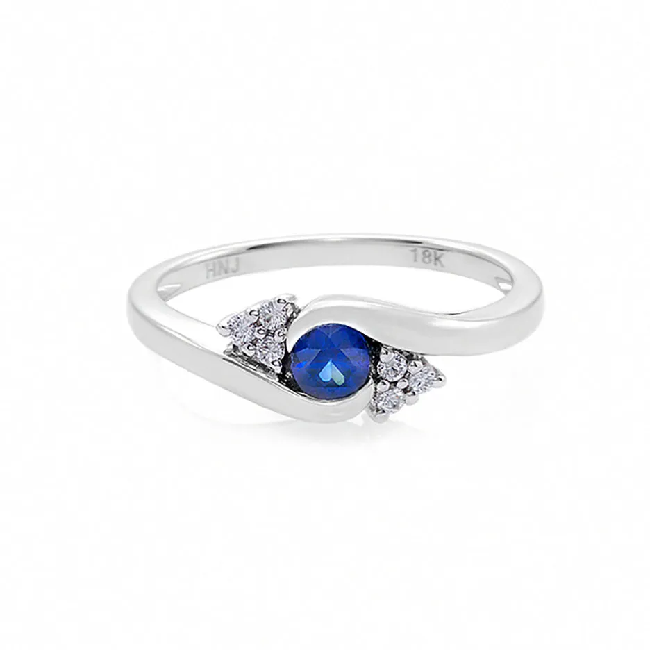 Blue Sapphire and Diamond Ring in White Gold